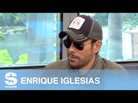 What Enrique Iglesias' Wife Thinks Of Him Kissing Fans