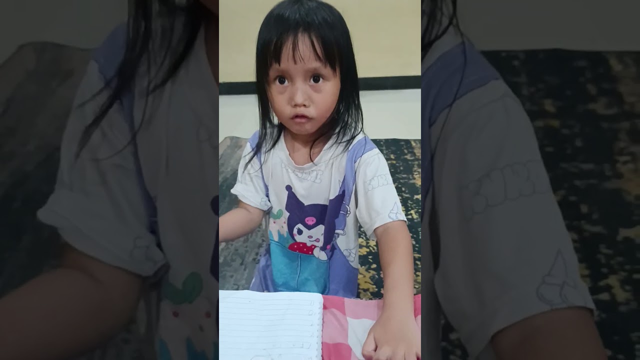 Adek belajar nulis  4 thn