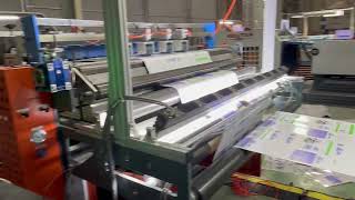 Watch how our printer print variable barcode integrated laminating machine online production