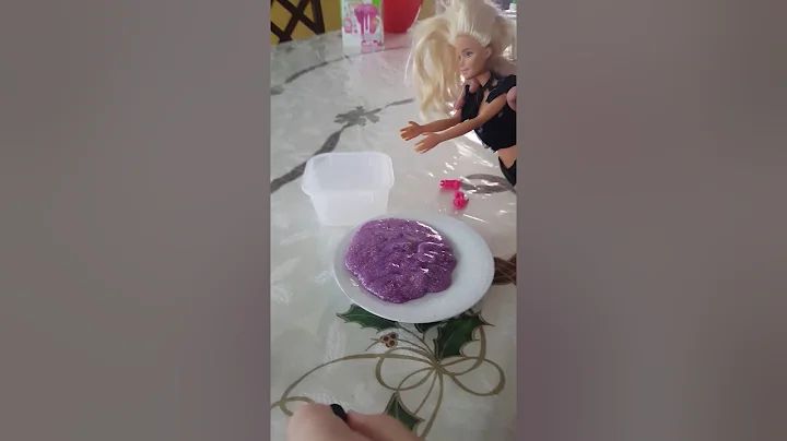 Sparkly slime doll plays with slime