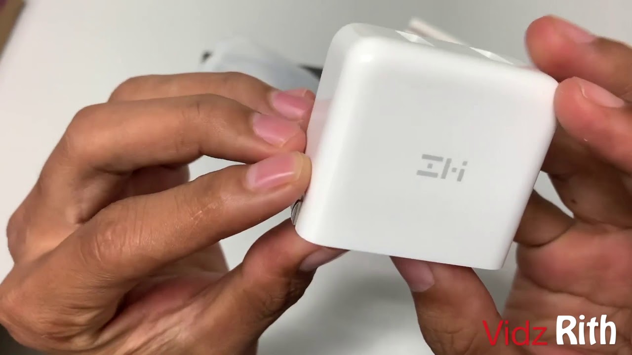 Unboxing  ZMI V2 Foldable Prong Travel Plug Wall Charger with 2 USB Ports.