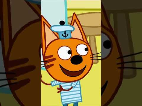 Коты играют с пылесосом