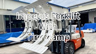 IMPETUS forklift with tire clamp and load extender