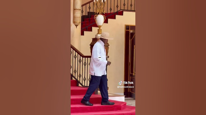President Museveni walks in State House