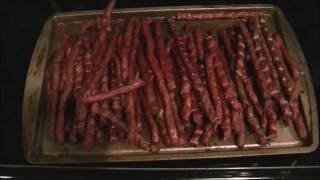 Making smoked snack sticks from fresh deer meat.
