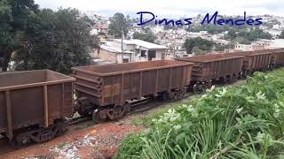 Dupla de u23c +GEc36-7 +AC44I com o trem do horto +um vagão tank