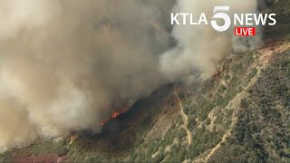 Crews battle brush fire burning in Mount Baldy area of Los Angeles