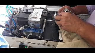 button wrapping machine