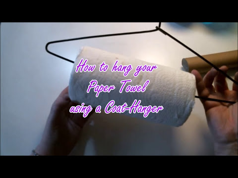 Paper towel holder out of a coat hanger. Self explanatory. :  r/somethingimade