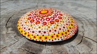 Orange Yellow and Red Painted Dot Mandala, made out of a homemade mold.