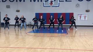 FMS teachers dance the songs of the decades for pep rally