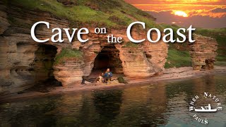 Tidal Cave Camp on Scotland's rugged coast.