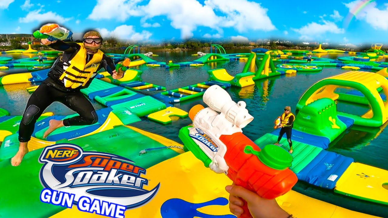 NERF SUPER SOAKER GUN GAME! Inflatable WATER PARK Edition!