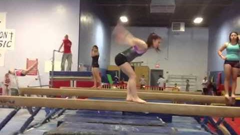Kayla Baddeley switch leap back tuck