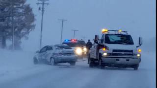 tri state towing pulling a car out of the ditch
