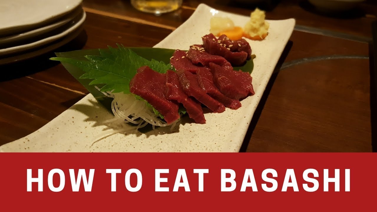 Kozo Tate teaches Jeff how to eat basashi