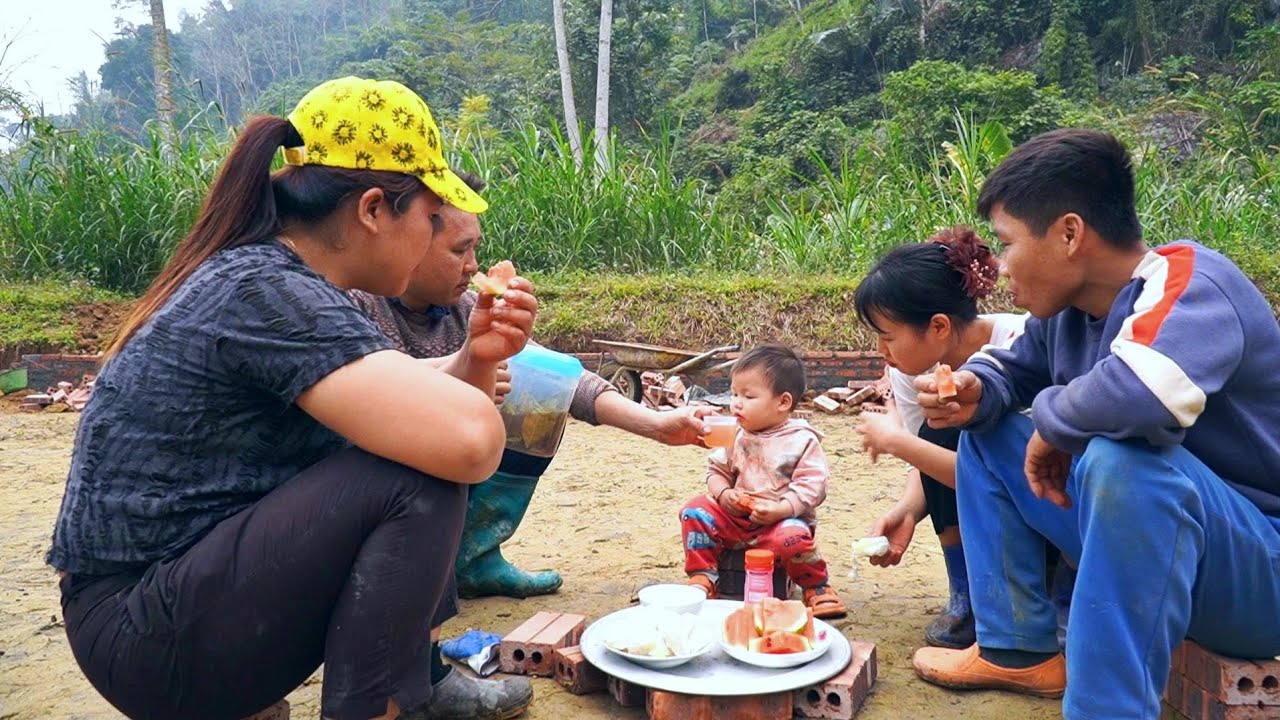 SU & HUYEN started renovating the fish pond with the help of BINH NGOC.