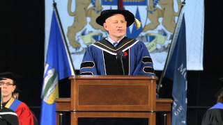 President David Docherty speaks to fall 2013 graduates