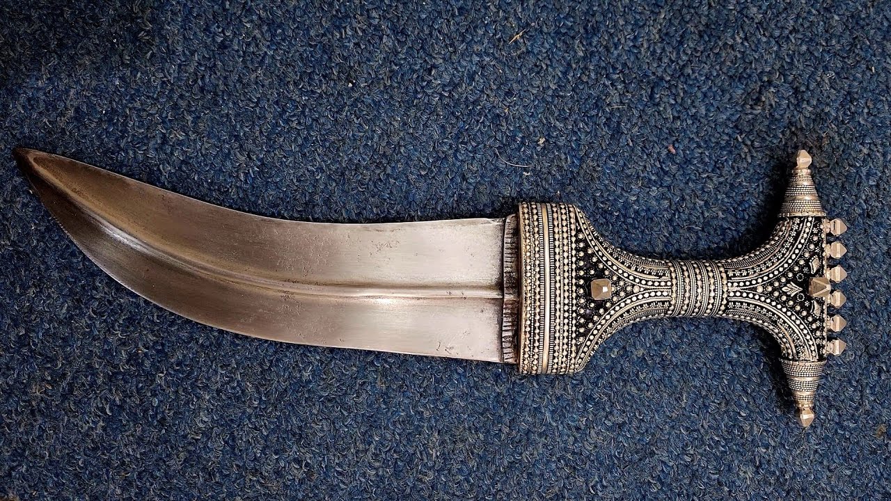 Dazzling Design The Silver-Embraced Arabian Dagger Curve Blade And Silver Crafted Handle.