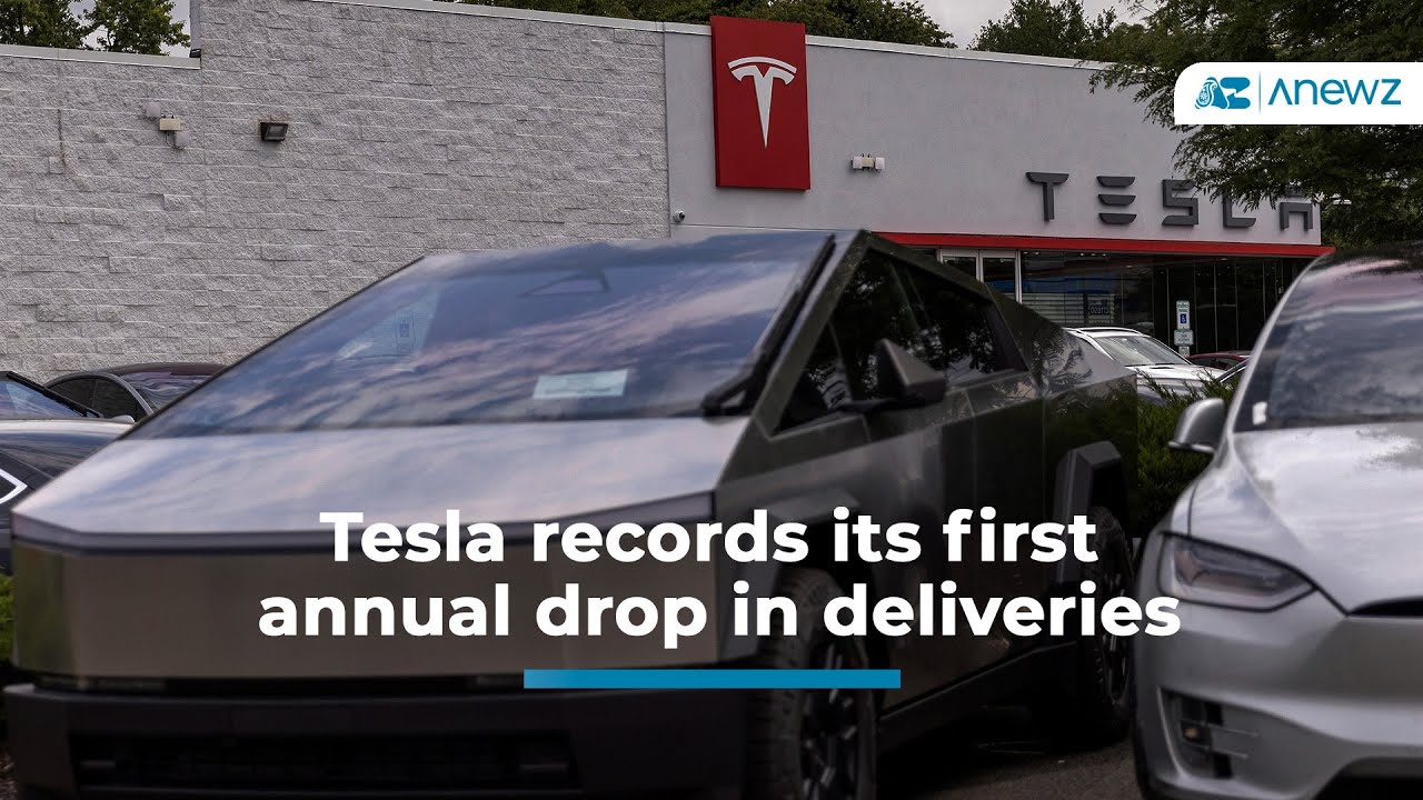 Tesla records its first annual drop in deliveries - YouTube