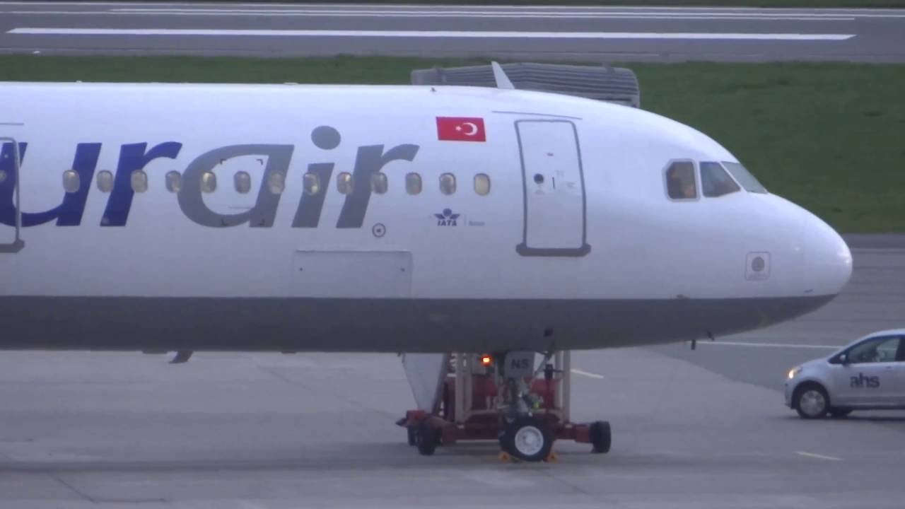Onur Air Airbus A321 TC-ONS parking at Hamburg Airport