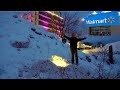 STEALTH CAMPING IN A HUGE SNOW PILE IN A WALMART PARKING LOT - Using Walmart Camping Gear and Food.