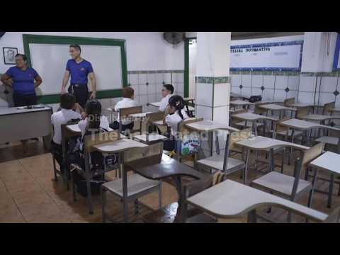 Months after devastating quake, Venezuelan children and teachers face conflicting return to school