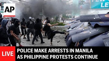 LIVE: Violence erupts near protests in the Philippines over corruption scandal