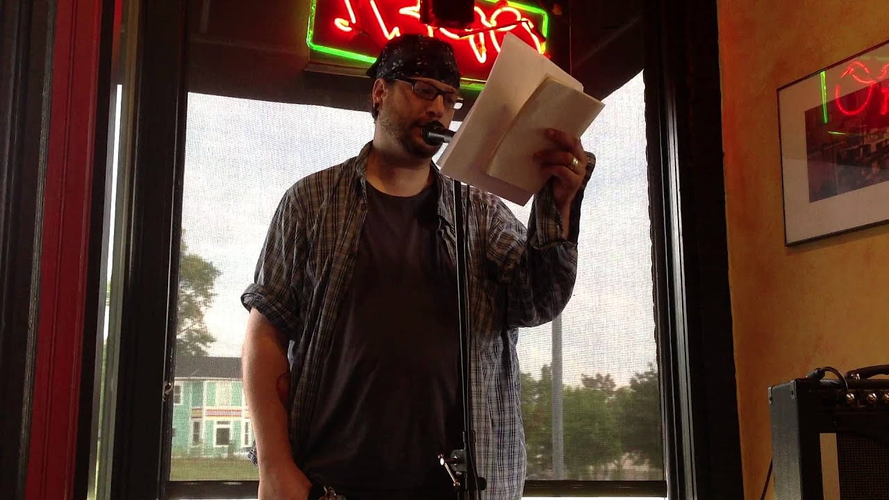 Poet Louis Murphy performing for the St Paul Almanac / Cracked Walnut Literary festival 2014