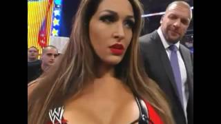 WWE Triple H looks at Nikki Bellas Boobs 