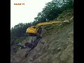 Overcoming a difficult path on an excavator