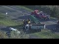 Garbage truck collides with truck hauling dumpster causing delays in Manassas