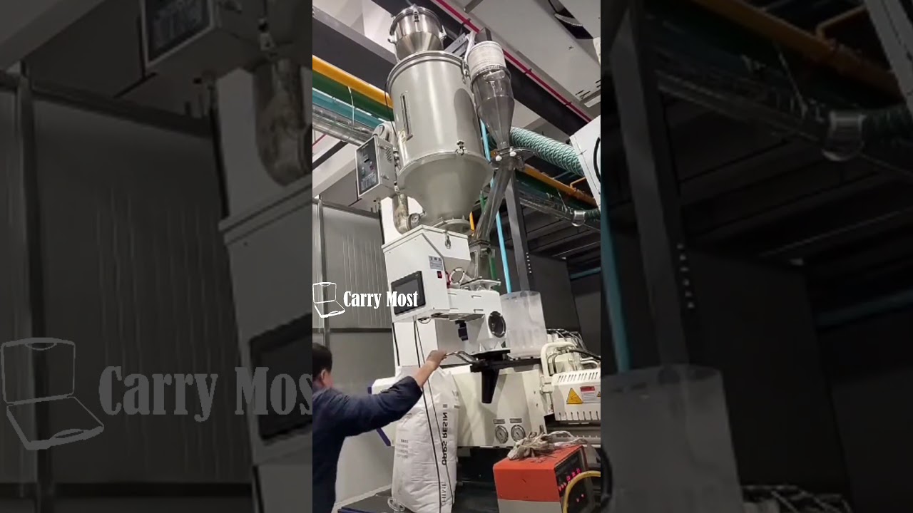Loading PP Raw Material into the Injection Molding Machine for Plastic Case Production  
