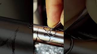Continue cutting the outline of the titanium fountain pen cap #benzjr #handengraving #metalart