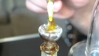 Grape Ape Dabs with C2 Glass Bullet Dabber on Daisy Quartz Domeless Nail Available at DabFarm.com