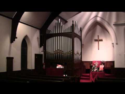 Chris Lawton at the organ of Mobberley Methodist C...