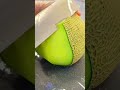 Peeling the skin of a fresh green melon with a sharp knife #shorts