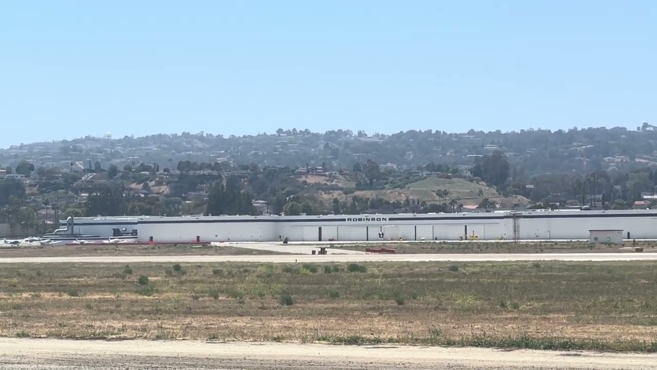 Robinson R44 Helicopter taking off from Torrance Airport 