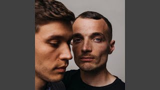 Mit den Füßen im Sand