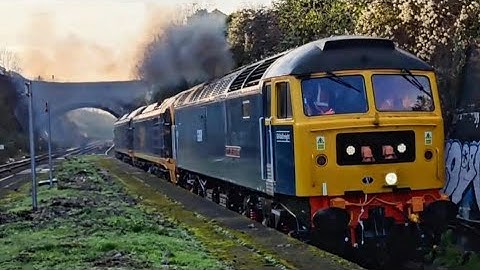 GBRf 99003 and 99004 being dragged by 47749 passing Parson Street 