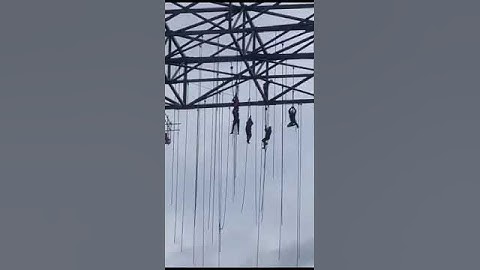 New high rise building scaffolding collapses leaving workers dangling 500ft in the air
