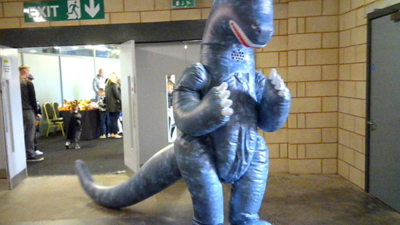 Inflatable Godzilla costume. 