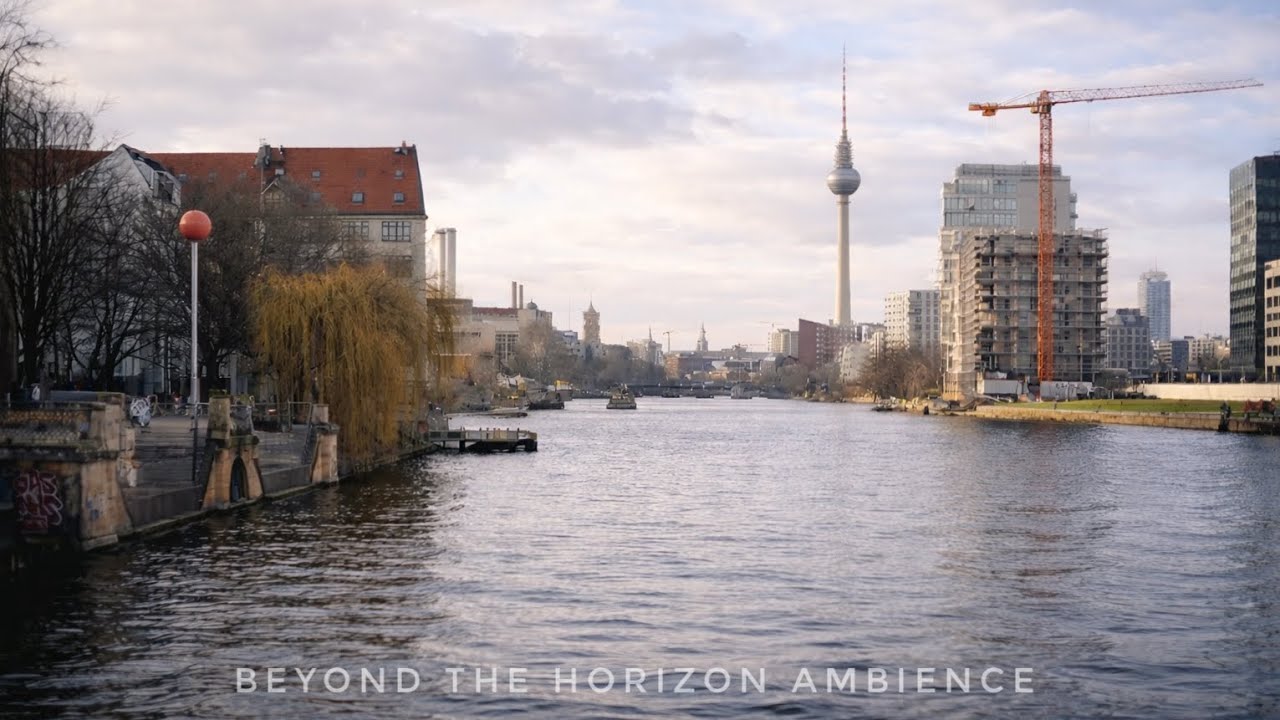Berlin riverfront • slow water and distant city
