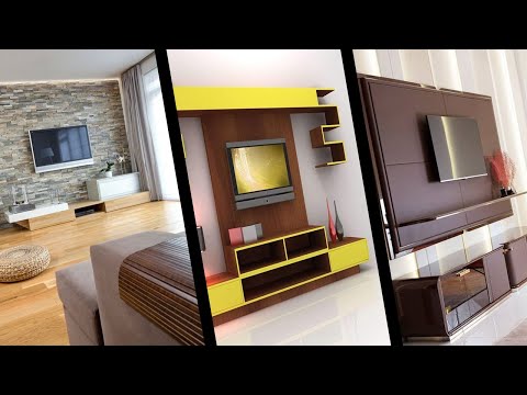 فيديو: تصميم الجدار مع تلفزيون في غرفة المعيشة (52 صورة): كيفية تزيين الحائط ، في أي ارتفاع لتعليق التلفزيون على الأرض ، أفكار التصميم