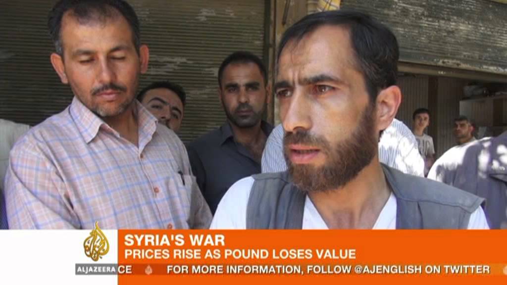 يعاني سكان حلب مع انهيار الليرة السورية