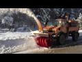 Mercedes-Benz Unimog U1450 and Schmidt snow blower in action