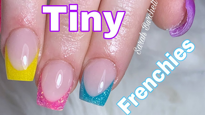 Short french tip acrylic nails with design
