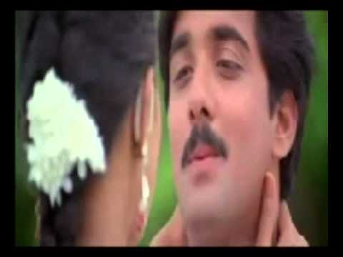 malaiyil nanaintha malligai poove song