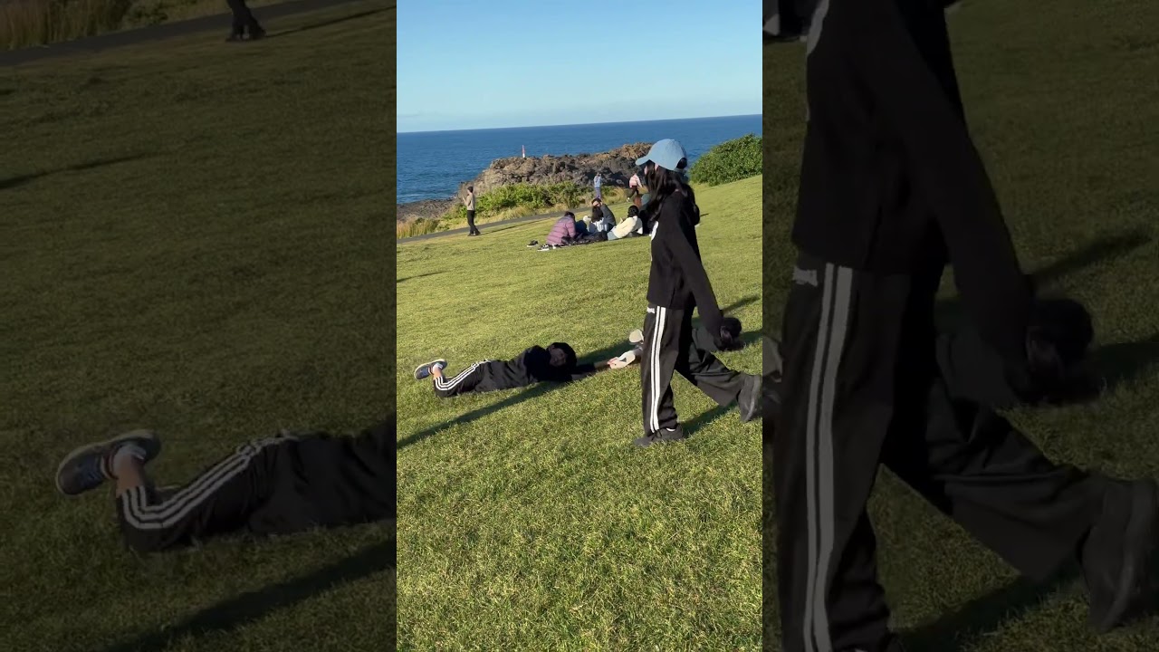 Rolling down the hill on Kiama blowhole reserve