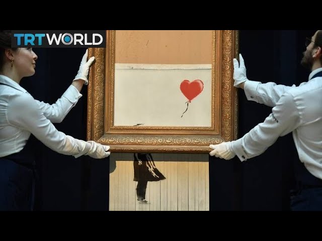 Partially shredded Banksy painting sells for record $25.4M | Money